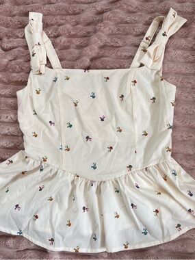 Cream Floral Peplum Tank Top with Adjustable Bow Straps